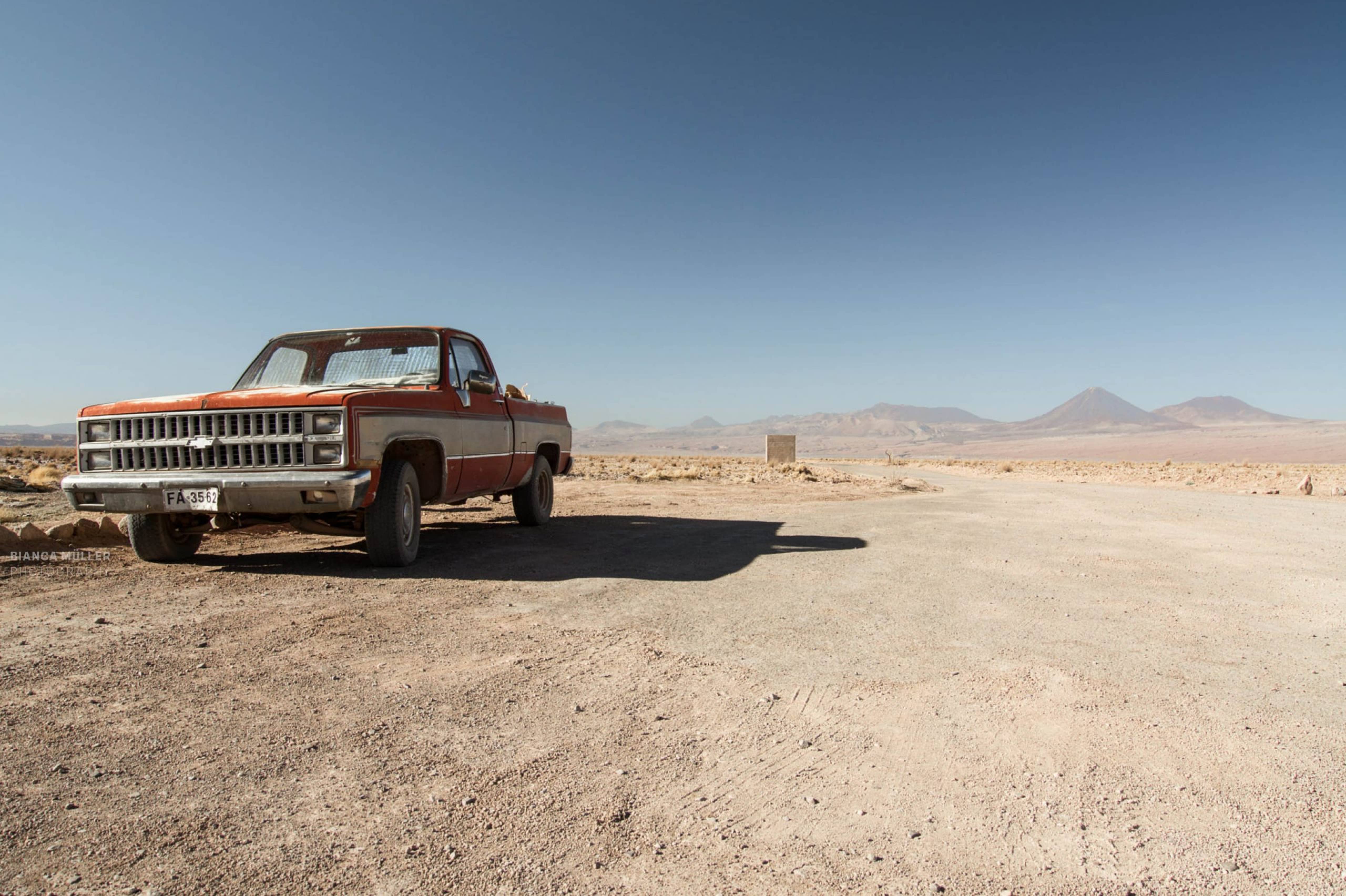 Car on the Left Side, Desert in the Background